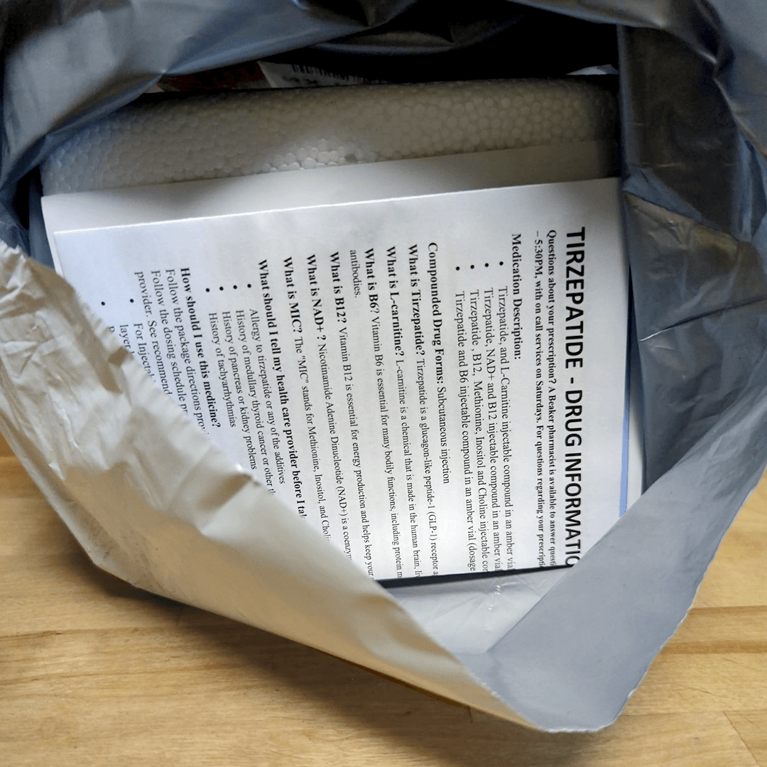 Fridays discreet outer mailer opened to reveal a styrofoam cooler insert and a printed tirzepatide drug information pamphlet inside